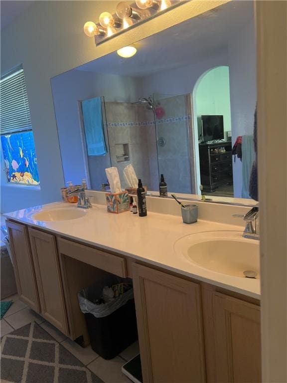 3454 Beale St, Bullhead City, AZ 86442 - full bathroom featuring double vanity, tile patterned floors, and tiled shower