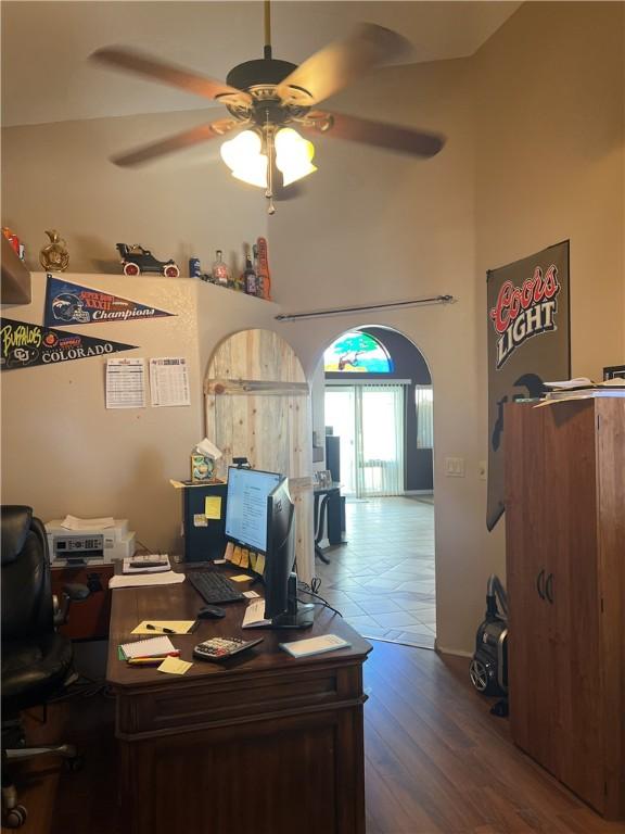 3454 Beale St, Bullhead City, AZ 86442 - office space featuring a ceiling fan, a high ceiling, and wood finished floors