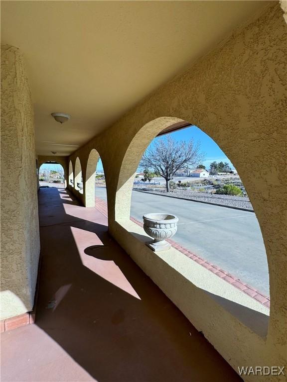 view of patio / terrace with a balcony