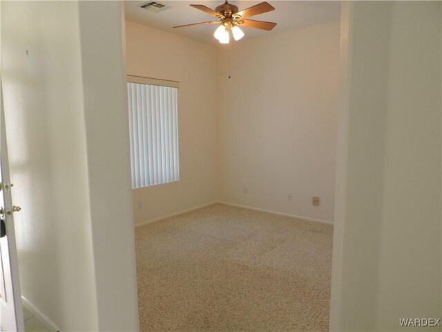 2353 Halfmoon Way, Bullhead City, AZ 86442 - empty room featuring ceiling fan, visible vents, and baseboards