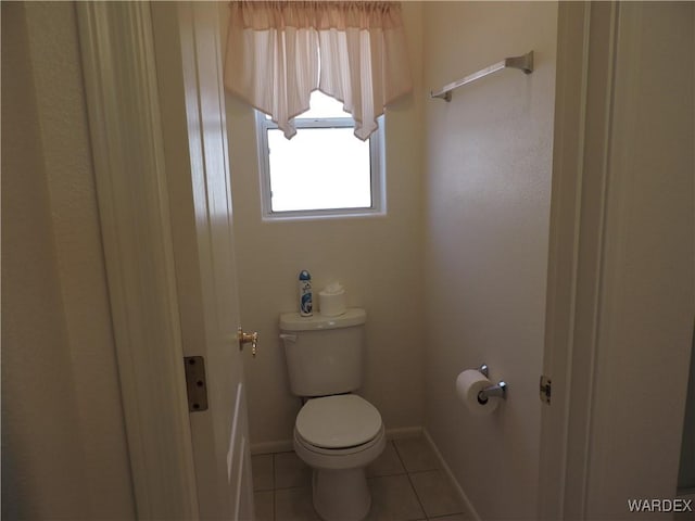 2353 Halfmoon Way, Bullhead City, AZ 86442 - bathroom featuring baseboards, tile patterned floors, and toilet