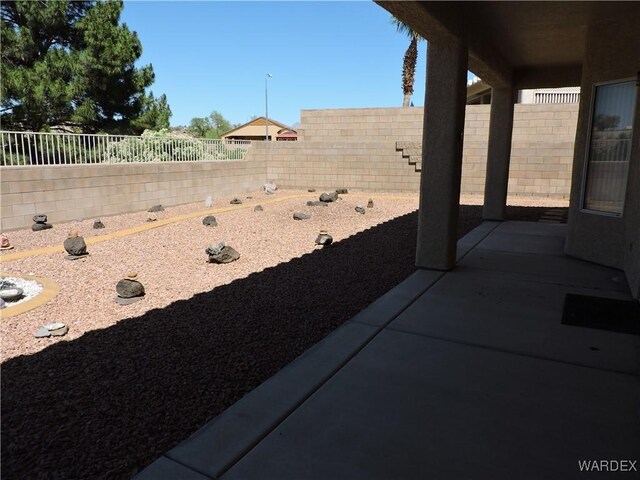 2353 Halfmoon Way, Bullhead City, AZ 86442 - view of yard with a patio and a fenced backyard