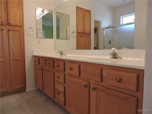 2353 Halfmoon Way, Bullhead City, AZ 86442 - full bath with double vanity, a sink, a shower with door, and a closet
