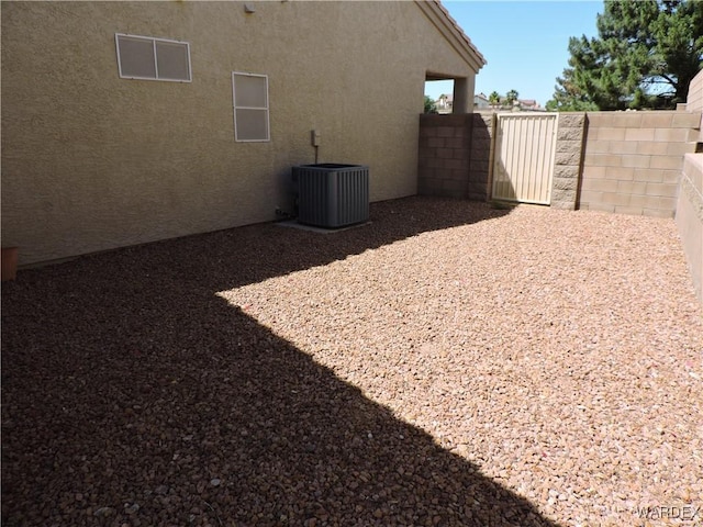 2353 Halfmoon Way, Bullhead City, AZ 86442 - view of yard with fence and central AC