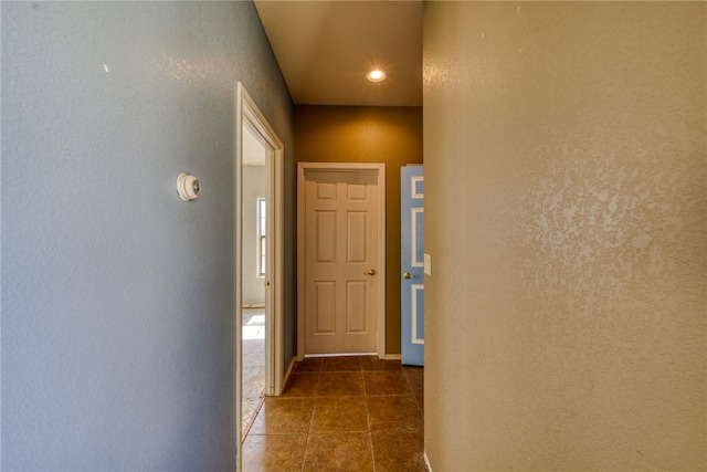 2230 Diamond Creek Rd, Bullhead City, AZ 86442 - corridor with tile patterned floors, a textured wall, and recessed lighting