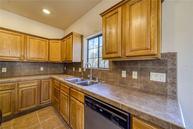 2230 Diamond Creek Rd, Bullhead City, AZ 86442 - kitchen featuring dishwasher, brown cabinetry, backsplash, and light tile patterned flooring