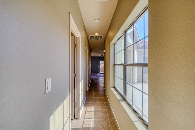 2230 Diamond Creek Rd, Bullhead City, AZ 86442 - hall with tile patterned floors and a textured wall