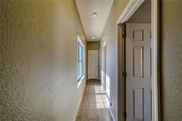 2230 Diamond Creek Rd, Bullhead City, AZ 86442 - corridor featuring a textured wall and tile patterned flooring