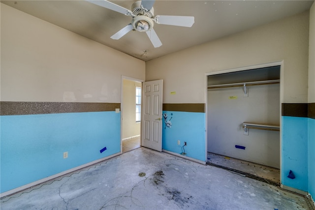 2230 Diamond Creek Rd, Bullhead City, AZ 86442 - unfurnished bedroom featuring concrete floors, a closet, a ceiling fan, and vaulted ceiling