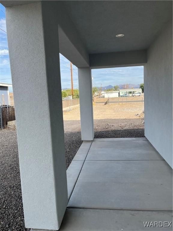 view of patio / terrace with fence