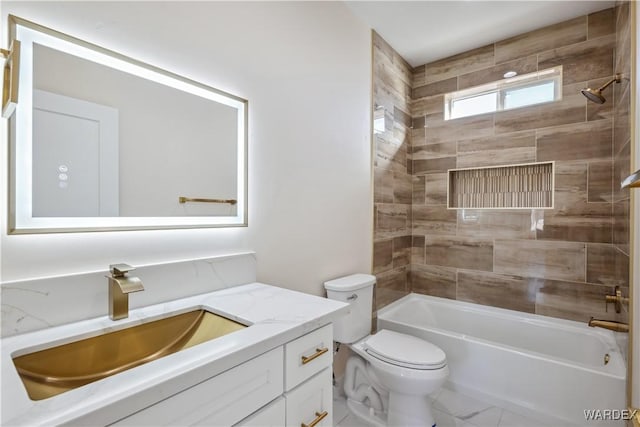 bathroom with toilet, bathtub / shower combination, and vanity