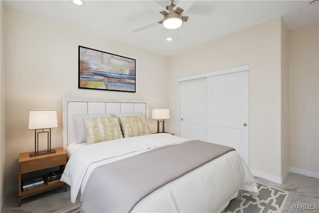 bedroom with a ceiling fan, baseboards, a closet, and recessed lighting