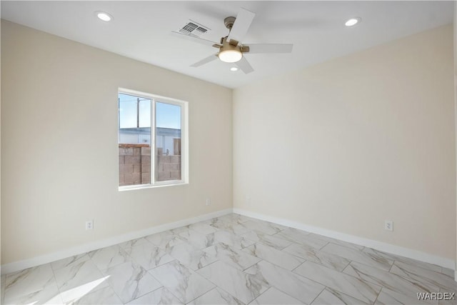 empty room featuring marble finish floor, recessed lighting, visible vents, ceiling fan, and baseboards