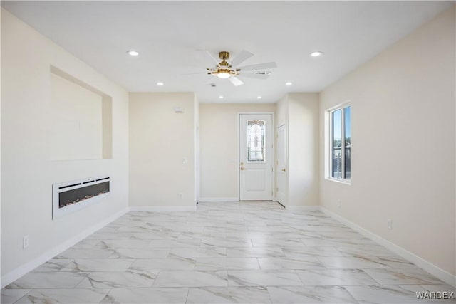 interior space featuring marble finish floor, a fireplace, heating unit, recessed lighting, and baseboards