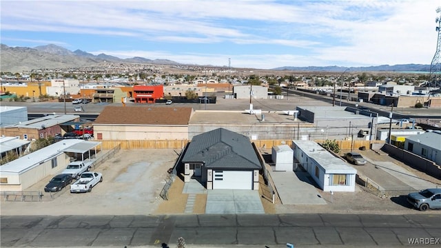 bird's eye view with a residential view and a mountain view