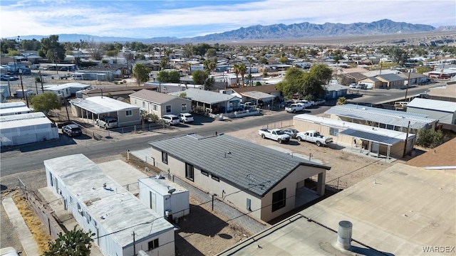 birds eye view of property with a residential view and a mountain view