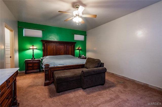 bedroom with carpet floors, baseboards, and a ceiling fan