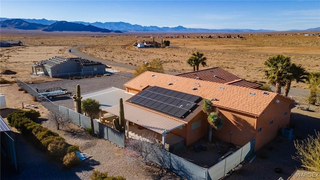 aerial view with view of desert, a rural view, and a mountain view