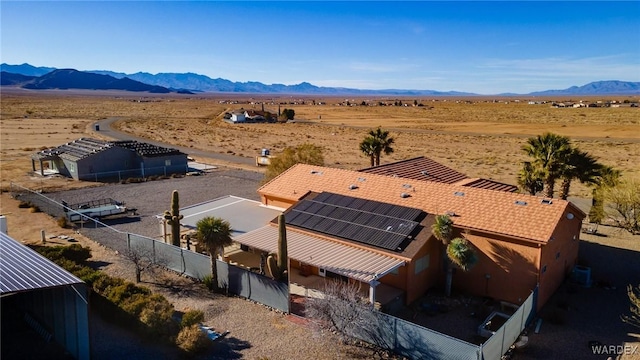 bird's eye view with view of desert and a mountain view