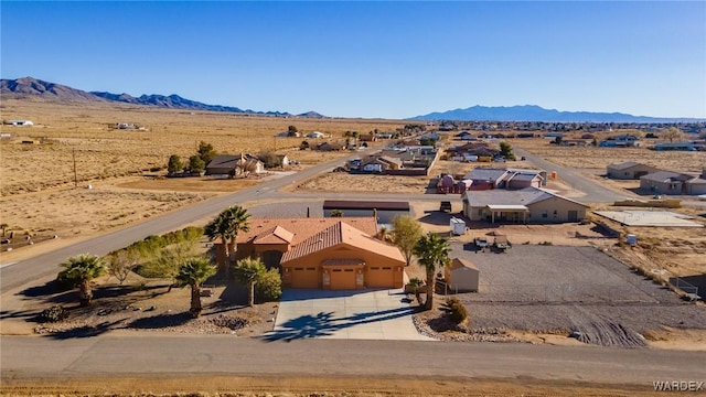 bird's eye view featuring a mountain view and a desert view