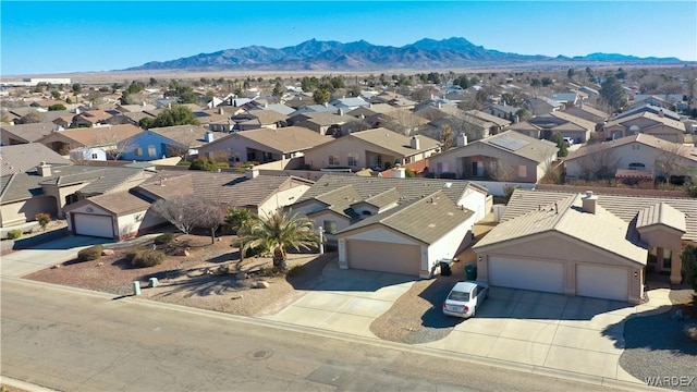 aerial view with a residential view and a mountain view