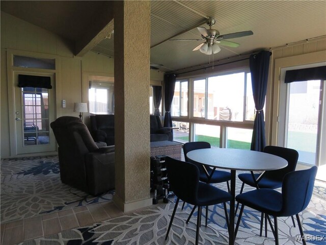 dining room featuring ceiling fan