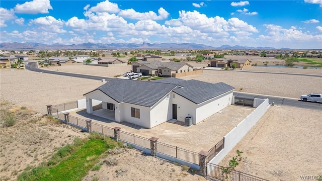 birds eye view of property featuring a residential view and a mountain view