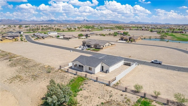 birds eye view of property with a residential view and a mountain view