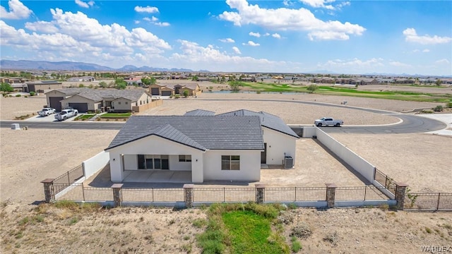 birds eye view of property featuring a residential view and a mountain view