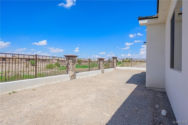 view of patio with fence