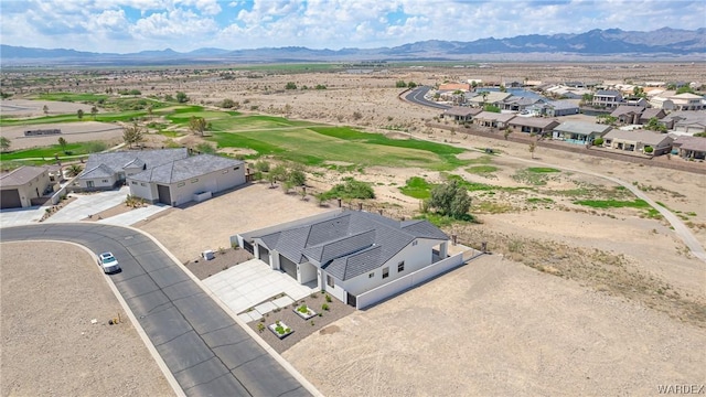 drone / aerial view with a residential view and a mountain view