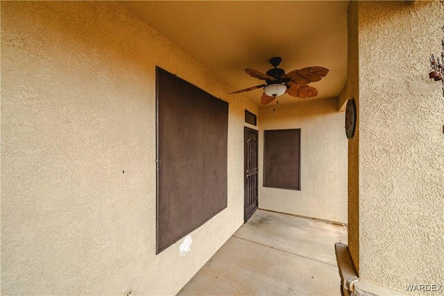 view of patio featuring a ceiling fan