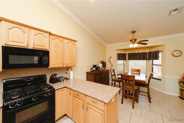 kitchen with light brown cabinets, black appliances, light countertops, and visible vents