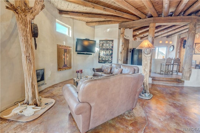 living room featuring beamed ceiling, wood ceiling, and concrete floors