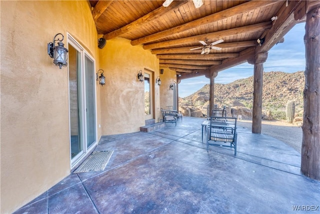 view of patio / terrace with a mountain view