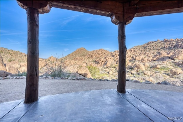 view of patio / terrace with a mountain view