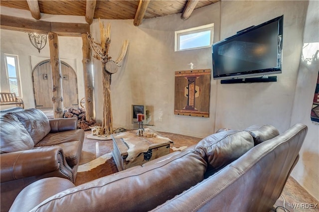 living room with beam ceiling and wood ceiling