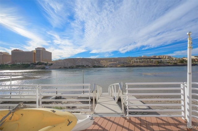 dock area with a water view