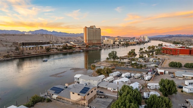 property view of water with a view of city and a mountain view