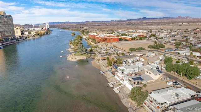 bird's eye view featuring a water and mountain view