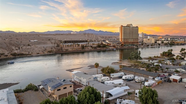 water view featuring a mountain view and a city view