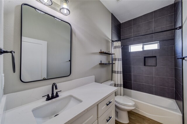 2339 E Calle Madrid, Fort Mohave, AZ 86426 - full bathroom featuring toilet, vanity, wood finished floors, and shower / tub combo