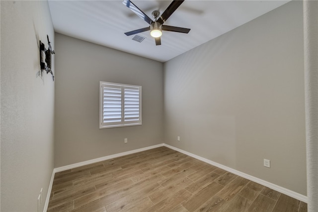 2339 E Calle Madrid, Fort Mohave, AZ 86426 - empty room featuring wood finished floors, ceiling fan, and baseboards