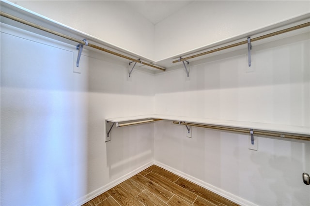 2339 E Calle Madrid, Fort Mohave, AZ 86426 - walk in closet with dark wood-type flooring