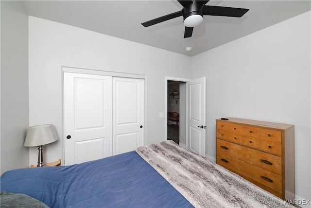 bedroom with a closet and a ceiling fan