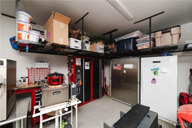 garage with freestanding refrigerator