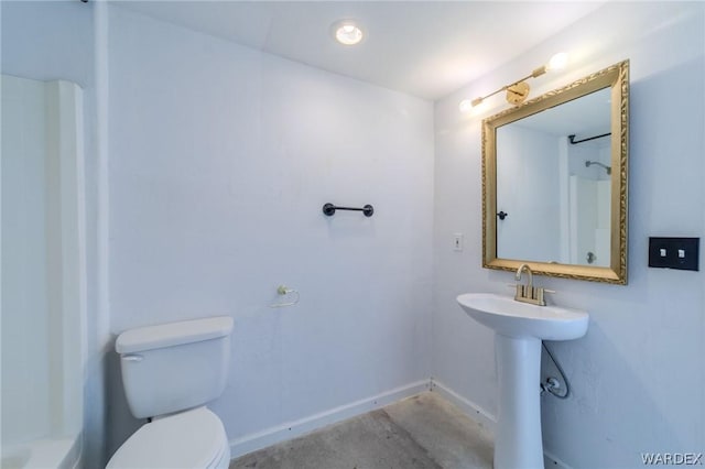 full bath with concrete flooring, toilet, and baseboards