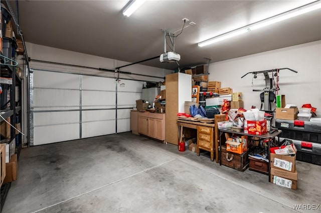 garage featuring a garage door opener