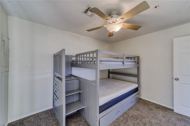 3408 Sunriver Rd Unit 207 B6, Bullhead City, AZ 86429 - carpeted bedroom featuring baseboards and a ceiling fan