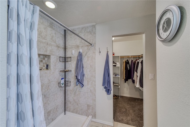 3408 Sunriver Rd Unit 207 B6, Bullhead City, AZ 86429 - full bath with a stall shower, a spacious closet, and baseboards